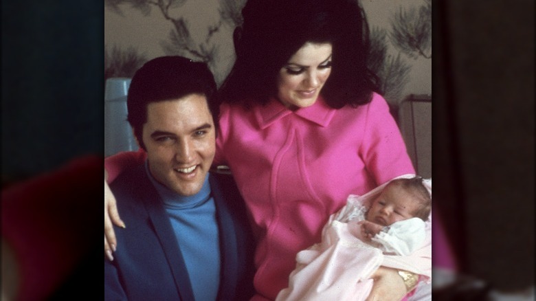 Elvis and Priscilla with Lisa Marie Presley