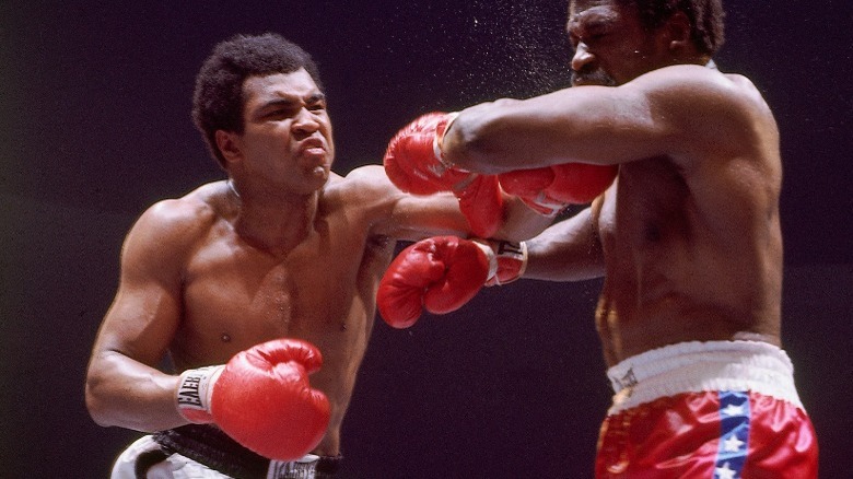 Muhammad Ali punching opponent