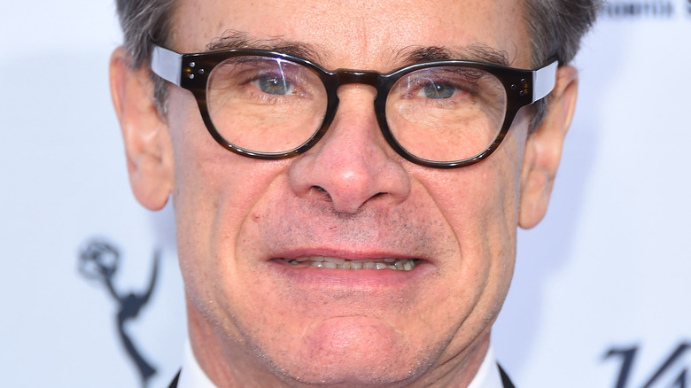 Peter Scolari smiles on the red carpet