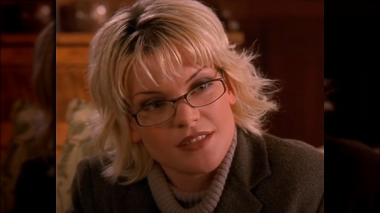 Pauley Perrette wearing glasses with blond hair