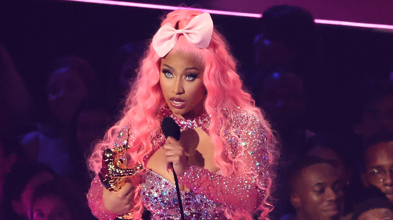 Nicki Minaj accepting award onstage