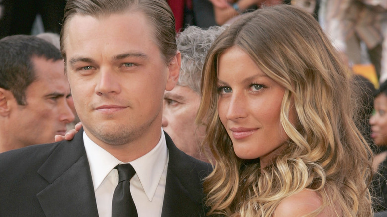 Leonard DiCaprio Gisele Bündchen smiling