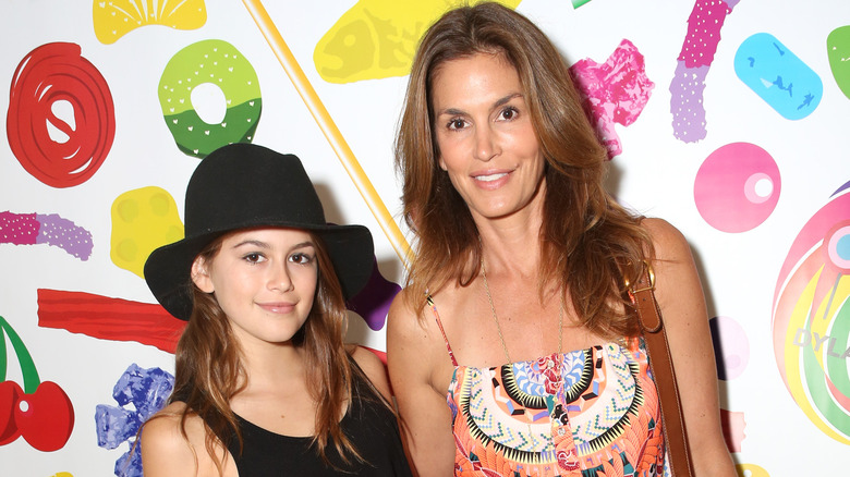 Kaia Gerber in black hat with Cindy Crawford