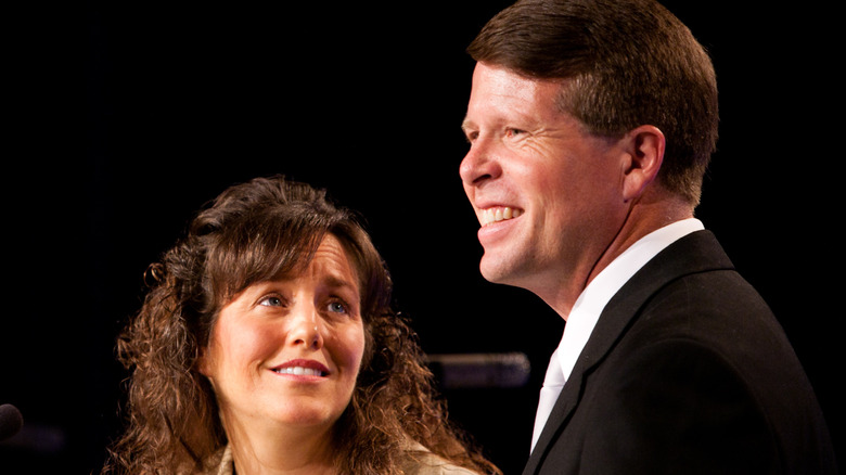 Michelle Duggar looking at Jim Bob Duggar