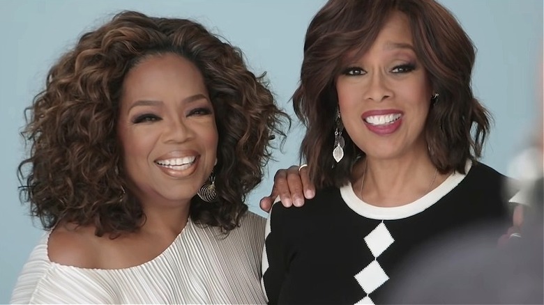 Oprah Winfrey smiling with Gayle King during a People shoot