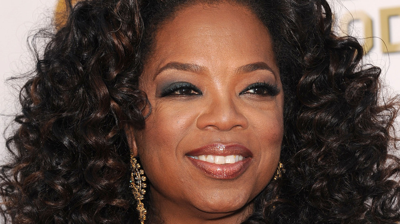 Oprah Winfrey grinning on the red carpet