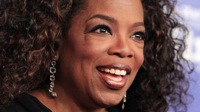 Oprah Winfrey on the red carpet, smiling