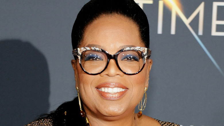 Oprah Winfrey smiling on Wrinkle in Time red carpet