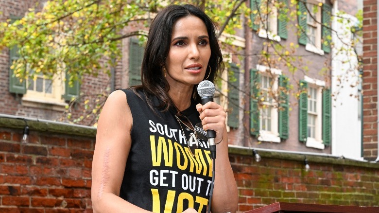 Padma Lakshmi holding a mic