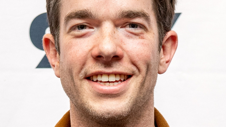 John Mulaney smiling