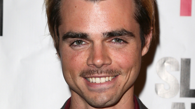 Reid Ewing smiling