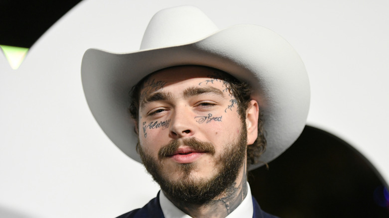 Post Malone wearing a hat