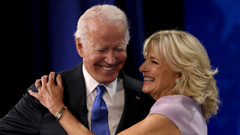 Joe Biden and Jill Biden embracing