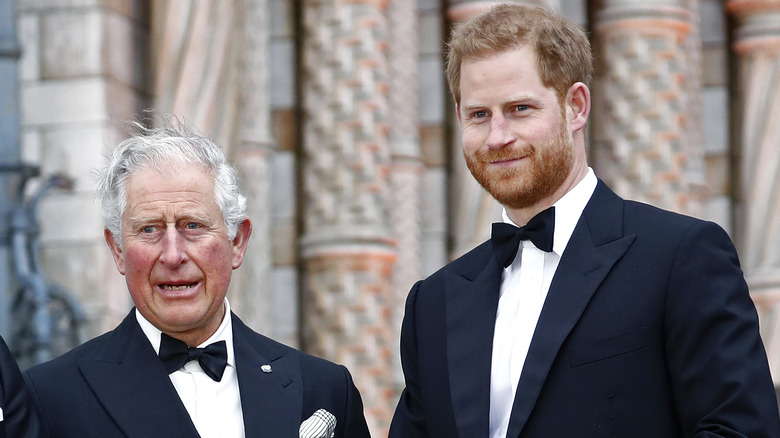 Prince Charles and Prince Harry posing