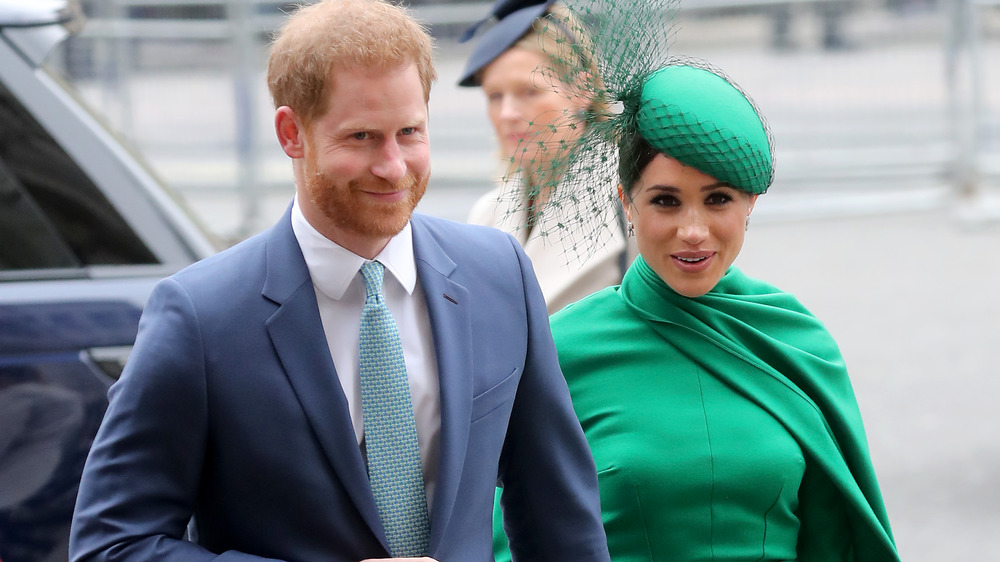 Prince Harry and Meghan Markle walking