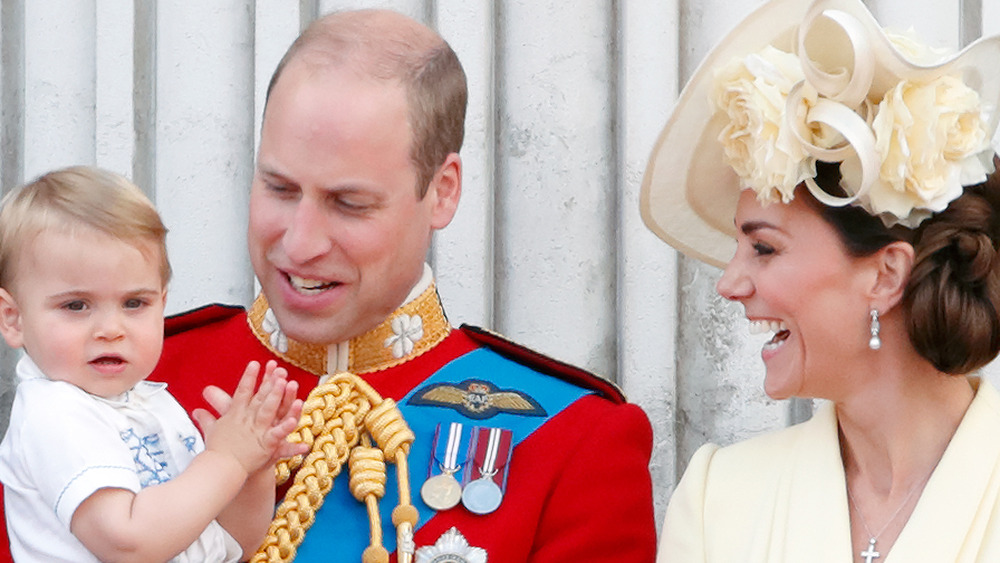 Prince William, Kate Middleton and Prince Louis pose