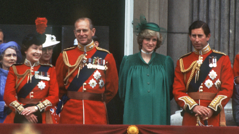 Queen Elizabeth II, Prince Philip, Princess Diana and Prince Charles at an event