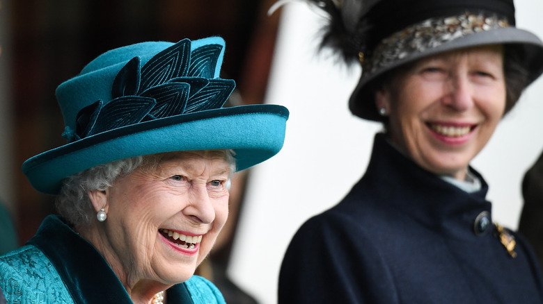 Queen Elizabeth and Princess Anne laughing