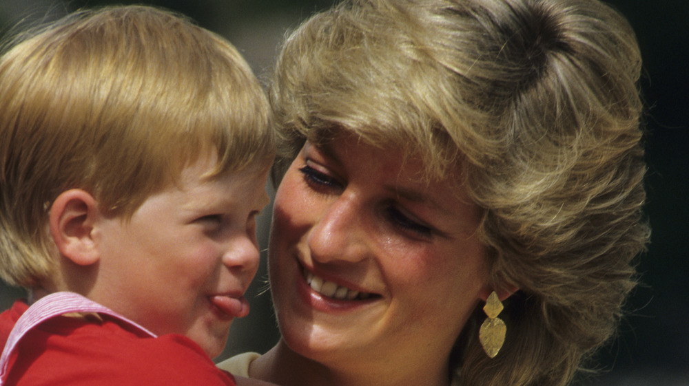 Princess Diana with Prince Harry on holiday 1987