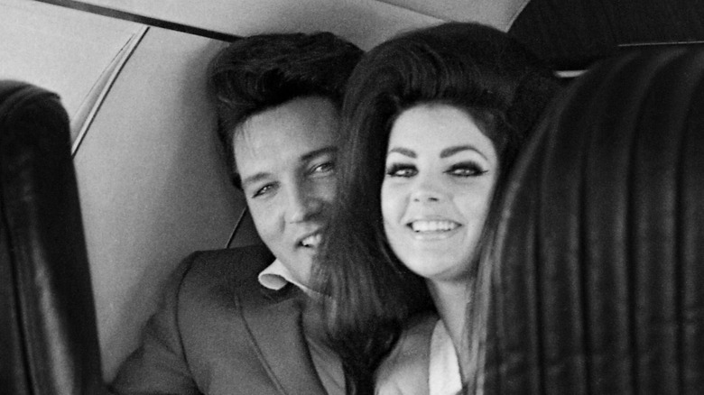 Elvis Presley and Priscilla Presley smiling