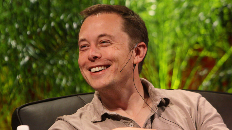 Elon Musk with a big smile