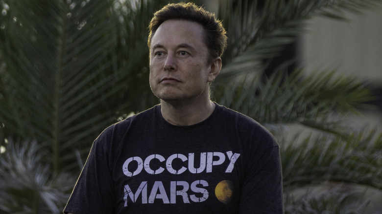 Elon Musk wearing a Mars t-shirt