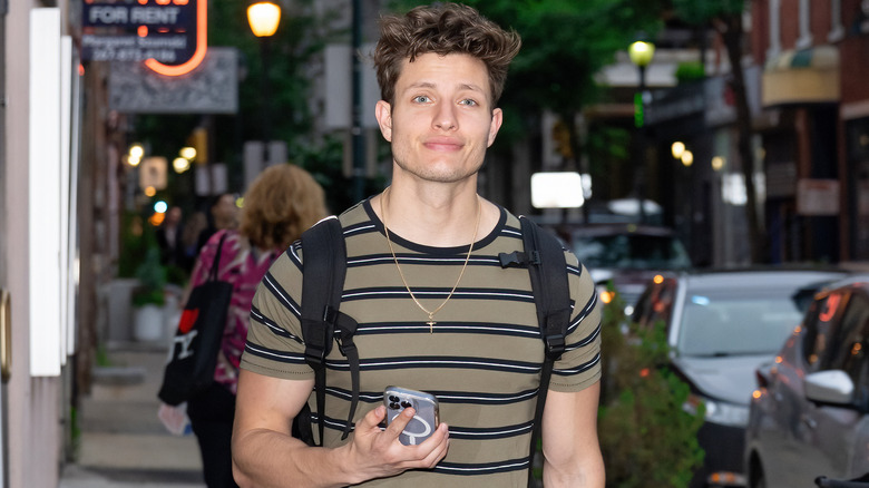 Matt Rife holding phone