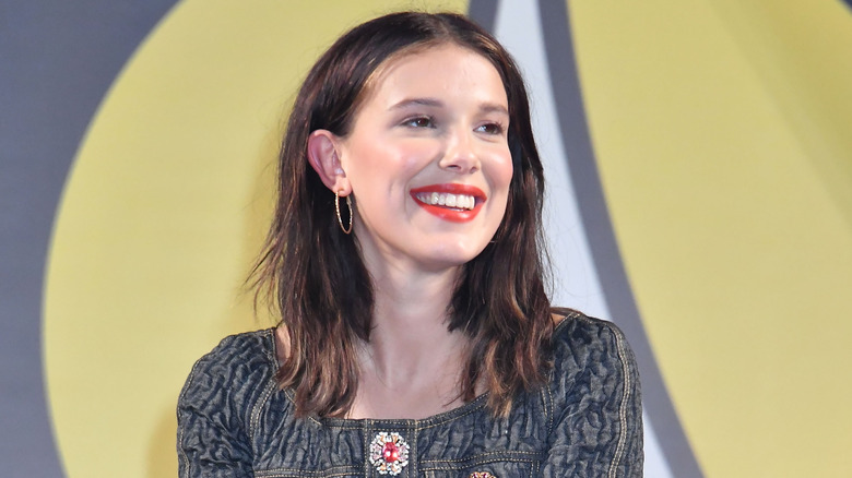 Millie Bobby Brown grinning