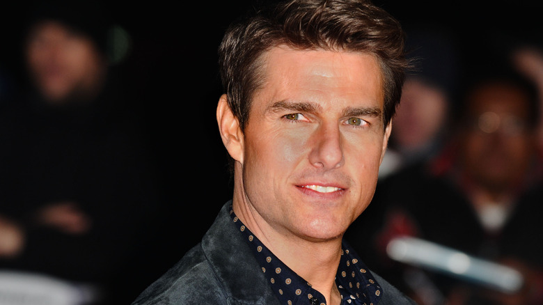 Tom Cruise smiling at movie premiere