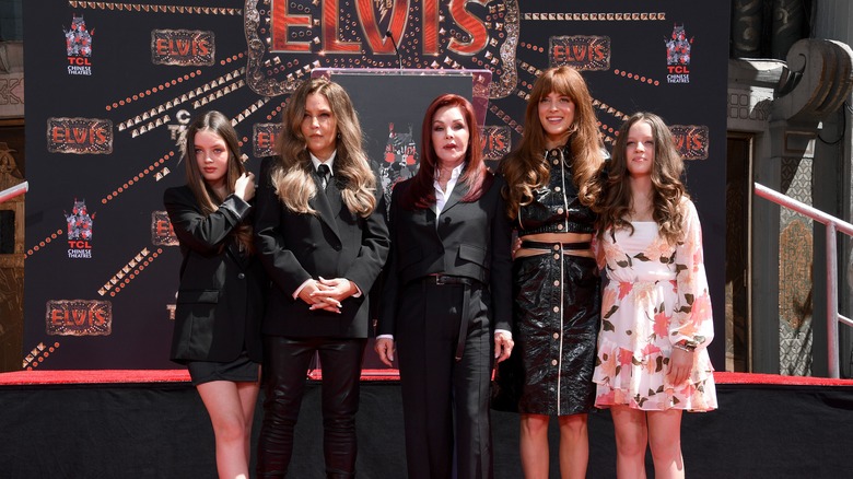 Riley Keough poses with her family during Elvis ceremony