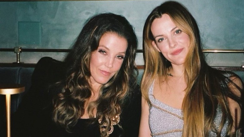 Riley Keough and Lisa Marie Presley smiling