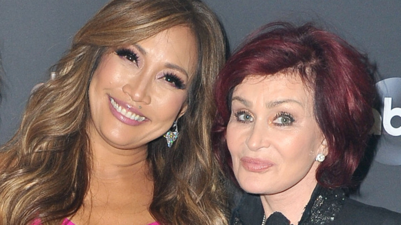 Carrie Ann Inaba and Sharon Osbourne posing