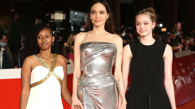 Shiloh Jolie Pitt with her mom and sister