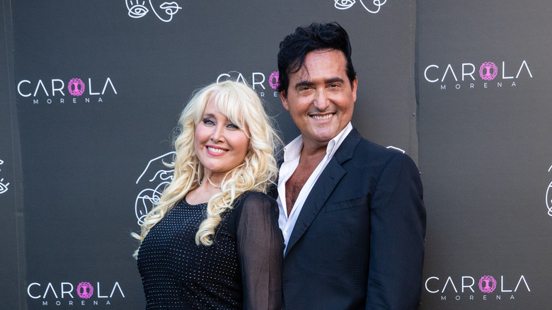 Carlos Marin and Geraldine Larrosa pose