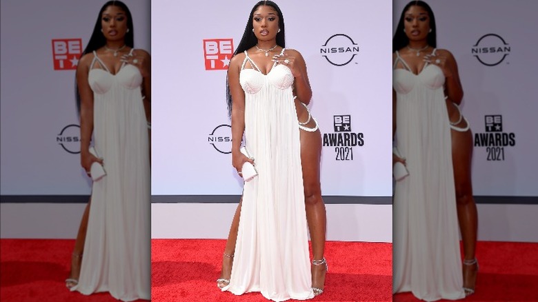 Megan Thee Stallion wears a white dress