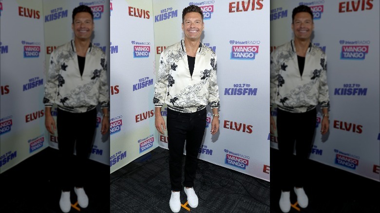 Ryan Seacrest posing