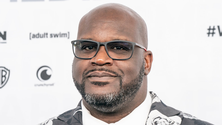 Shaquille O'Neal smiling in glasses