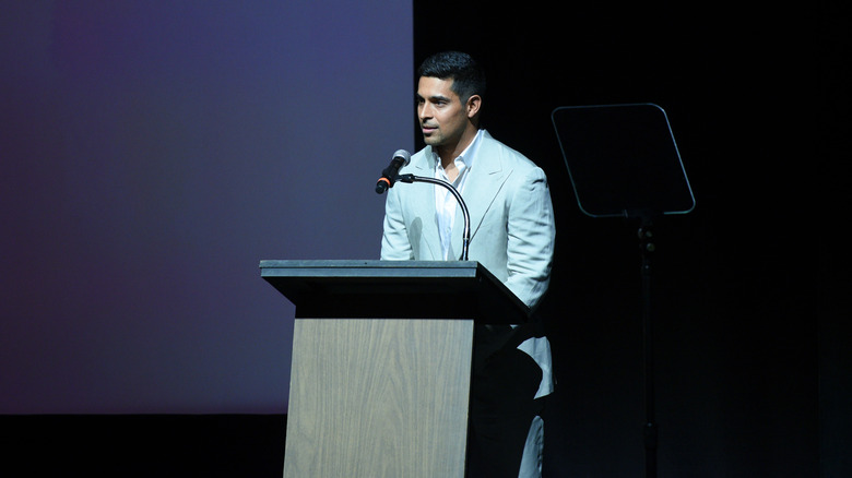 Wilmer Valderrama speaking at the podium