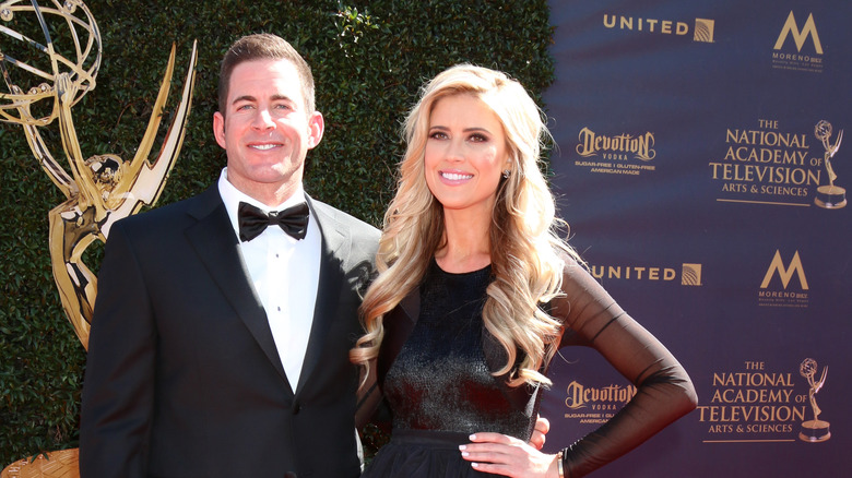 Tarek El Moussa and Heather Rae Young pose 