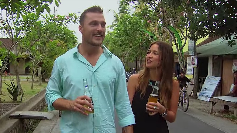 Chris Soules holding hands with Kaitlyn Bristowe