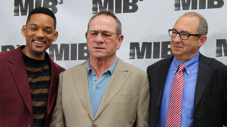 Will Smith on the red carpet with Tommy Lee Jones and Barry Sonnenfeld