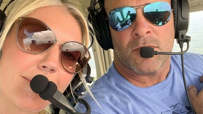 Bryan and Sarah Bauemler in a helicopter