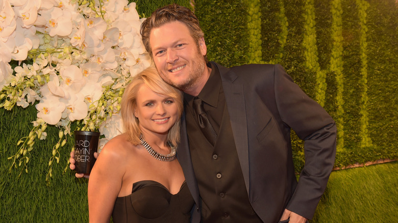 Blake Shelton and Miranda Lambert pose 