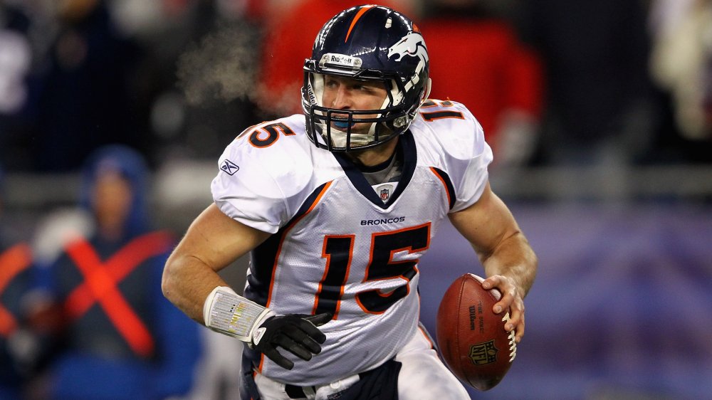 Tim Tebow playing for the Denver Broncos