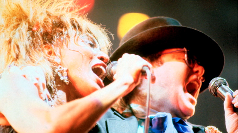 Tina Turner Elton John singing on stage