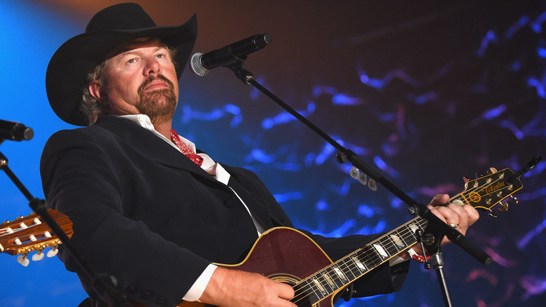 Toby Keith playing guitar