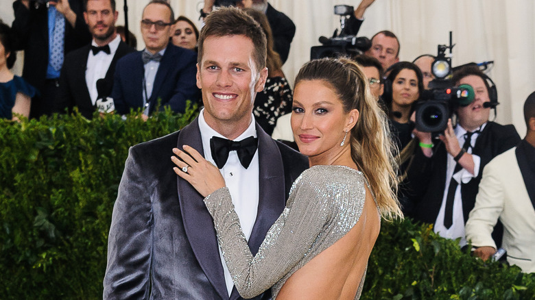 Tom Brady and Gisele Bündchen pose 