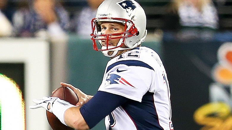 Tom Brady in Patriots helmet