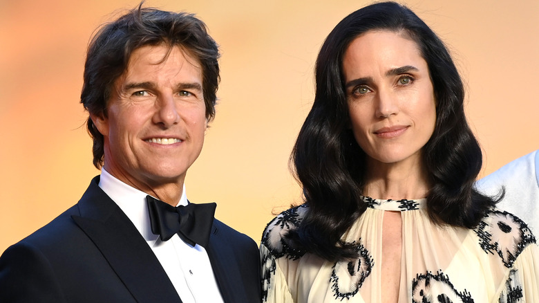 Tom Cruise and Jennifer Connelly posing