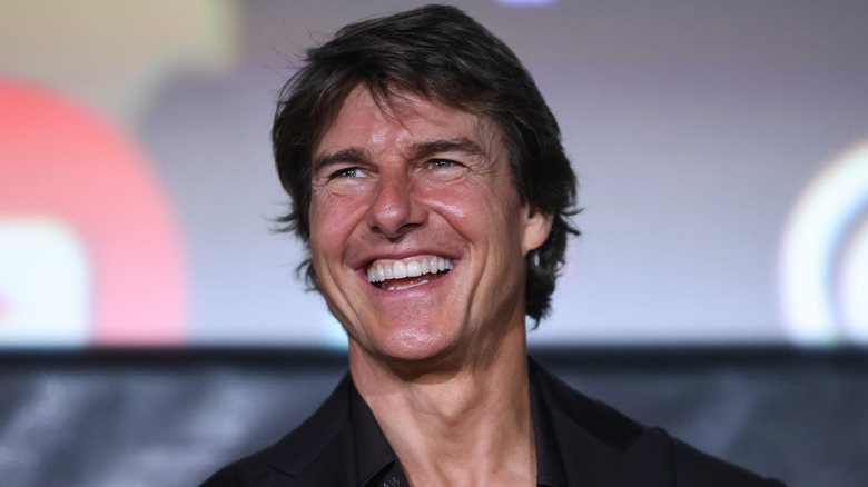 Tom Cruise laughing long hair